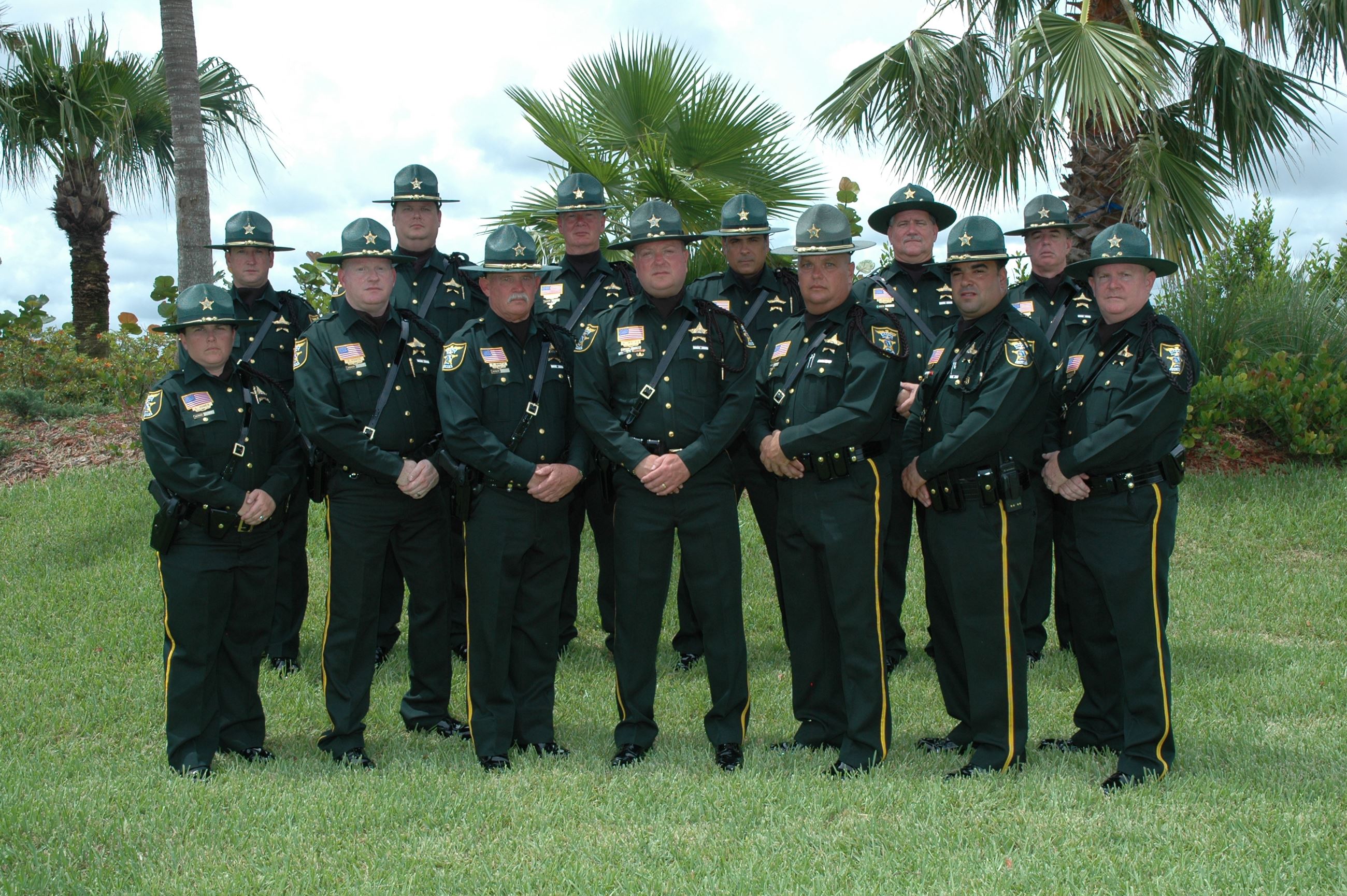 MCSO Honor Guard Unit in dress uniform outside on grass