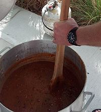 Pot of Chili Being Stirred by the BBQ Grill Team